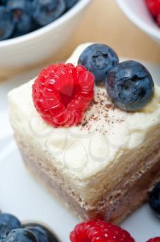 fresh homemade raspberry and blueberry cream cake 