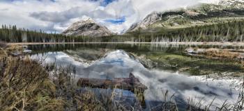 Reflective Buller Pond in Canada's Alberta Rockie Mountains