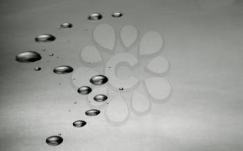 Royalty Free Photo of Drops on Grey