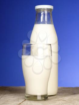 Royalty Free Photo of a Bottle of Milk and Glass