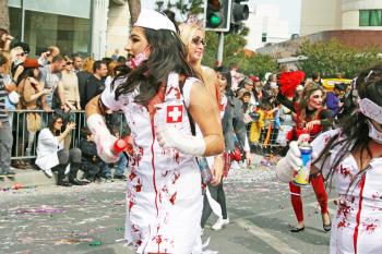 Royalty Free Photo of People Wearing Costumes in a Parade