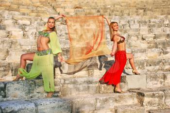 Royalty Free Photo of Belly Dancers on the Stairs of the Kourion Amphitheatre