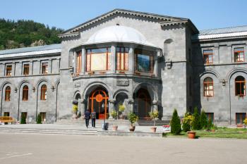 Royalty Free Photo of People by a Building in Jermuk, Armenia