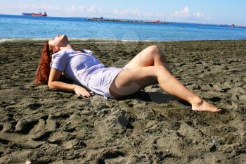 Royalty Free Photo of a Woman on the Beach