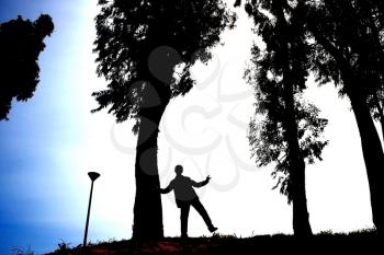 Royalty Free Photo of a Silhouette of a Teenage Boy