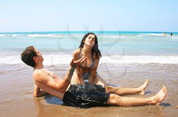 Royalty Free Photo of a Teen Couple on the Beach