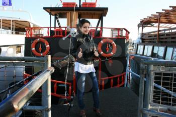 Royalty Free Photo of a Woman on a Boat