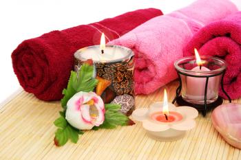 Royalty Free Photo of Candles by Towels