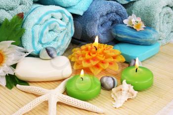 Royalty Free Photo of Candles by Towels