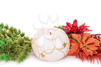 Christmas decoration with candle isolated on white background.