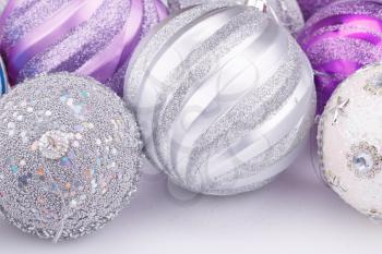 Christmas colorful balls on gray background.