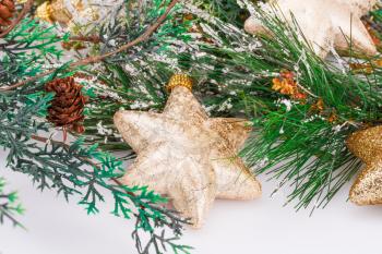 Christmas yellow stars and fir tree on gray background.