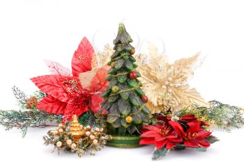 Fir tree candles and holly berry flowers  isolated on white background.
