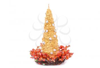 Christmas candle and  decoration with red stones isolated on white background.