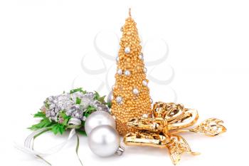 Christmas candle, balls, ribbon and  flower decoration isolated on white background.