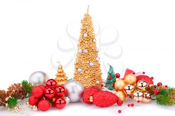 Christmas candles, balls and  fir tree branches  isolated on white background.