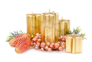 Christmas candles, cones and decoration isolated on white background.