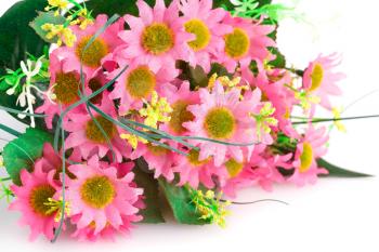 Pink fabric flowers isolated on white background.