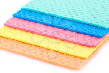 Colorful sponges on white background.