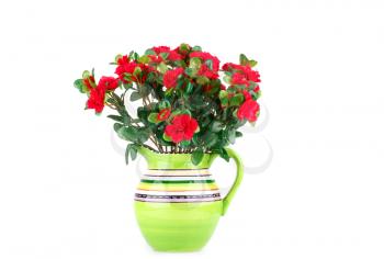 Red fabric flowers in vase isolated on white background.