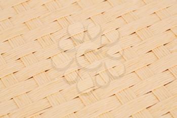 Rattan placemat texture for background, close-up image.