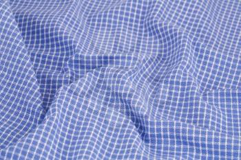 Checkered tablecloth texture as a background, closeup picture.