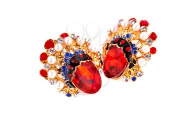 Stylish earrings  with colorful stones isolated on white background.