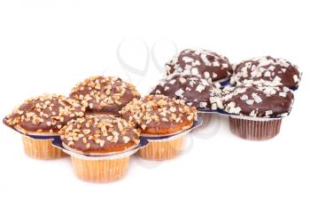 Muffins with chocolate and nuts isolated on white background.