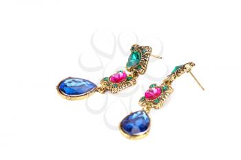 Stylish earrings with colorful stones isolated on white background.