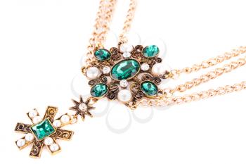 Stylish necklace with green stones and pearls isolated on white background.