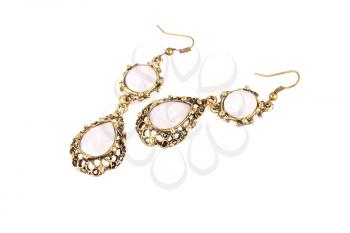 Ancient style earrings isolated on a white background.