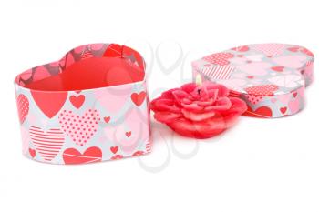 Red rose candle and gift box isolated on white background.