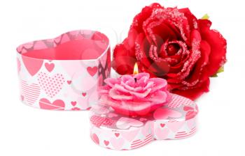 Red rose,  candle and gift box isolated on white background.