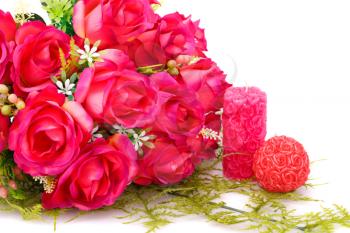 Candles, roses and glass heart  isolated on white background.