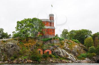 Kastellet with Swedish flag on Kastellholmen island in Stockholm, Sweden.