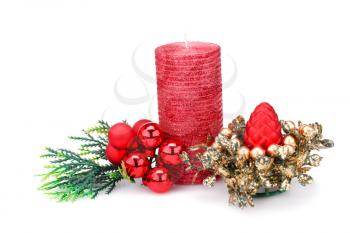 Christmas candle, balls and decoration isolated on white background.