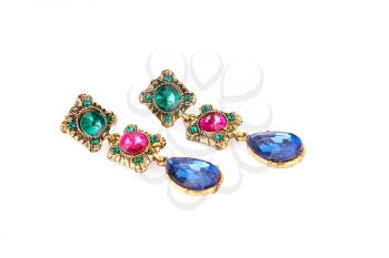 Stylish earrings with colorful stones isolated on white background.