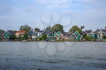 Zaanse Schans village with river and houses in The Netherlands.