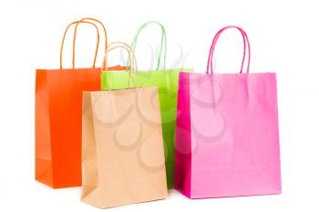Colorful paper shopping bags isolated on white background.
