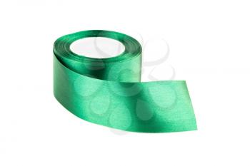 Green silk ribbon reel isolated on white background.