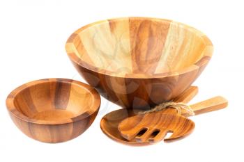 Wooden bowls, spoon and fork, isolated on white background.