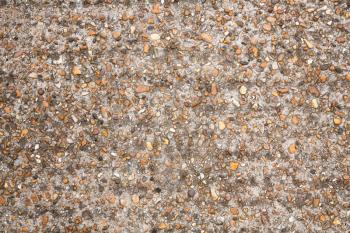 The texture of the small stones floor as a background.