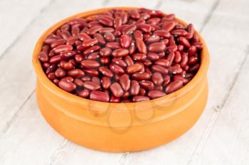 Red kidney beans in the ceramic pot.