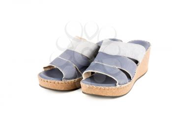 Stylish summer leather shoes isolated on white background.