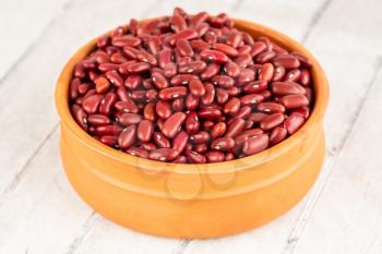 Red kidney beans in the ceramic pot.