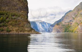 Landscape with Naeroyfjord and high mountains in Norway.