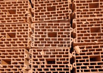 Heap of bricks. On construction of building.