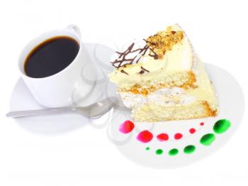 Sponge cake and on original decorating plate with cup of coffee. Isolated