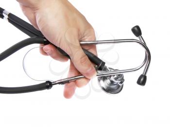 Medicine stethoscope in doctor's hand on white background . Isolated.