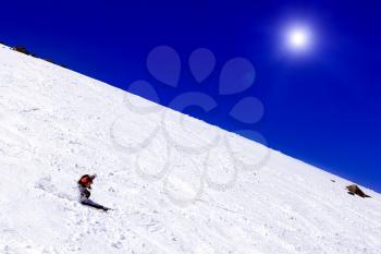 A skier descending Mount Elbrus - the highest peak in Europe.